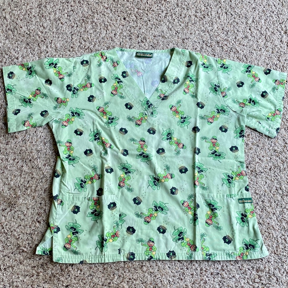UA scrubs St. Patrick’s Day top